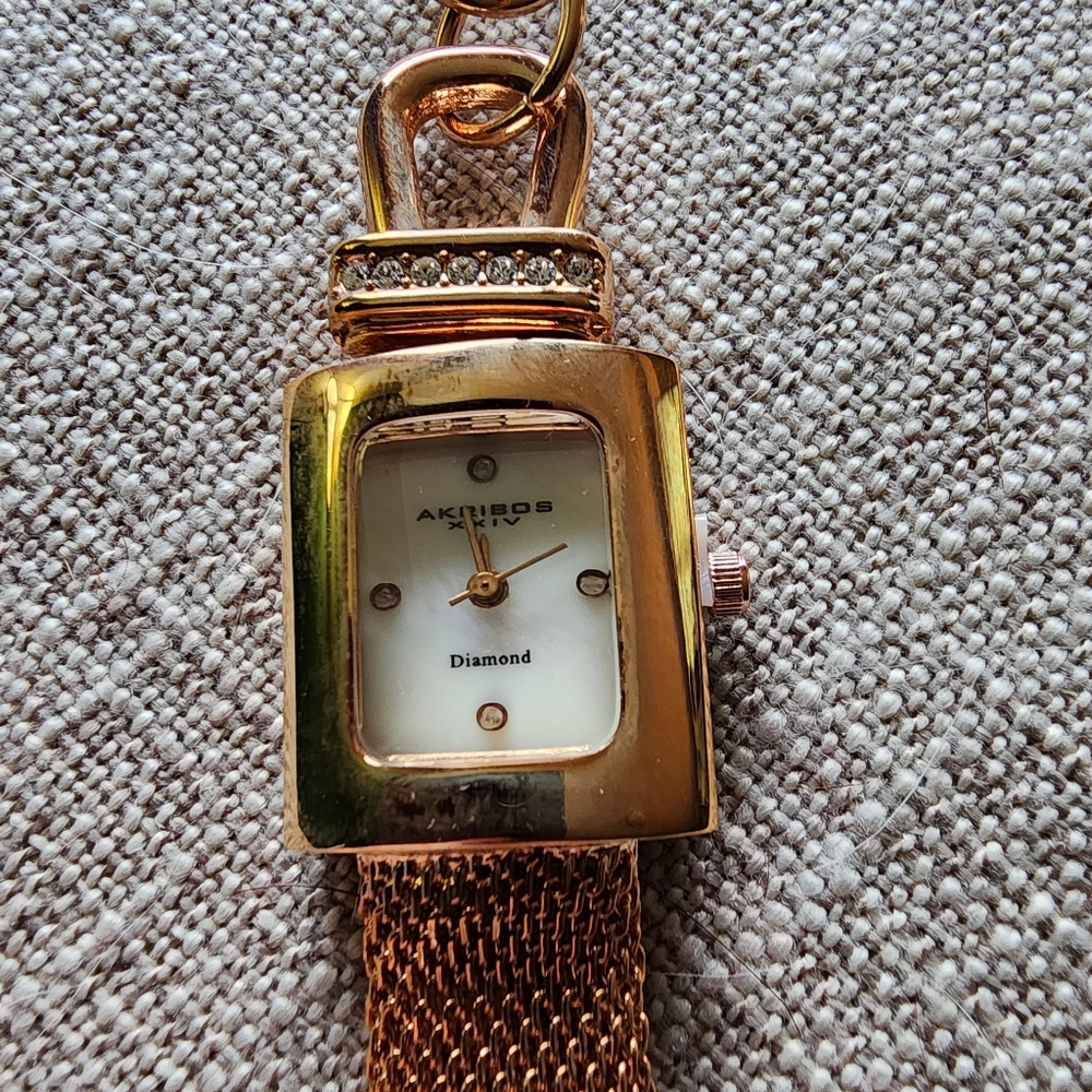 Akribos XXIV AK510YG Women's mesh wrap-around crystal accented quartz watch